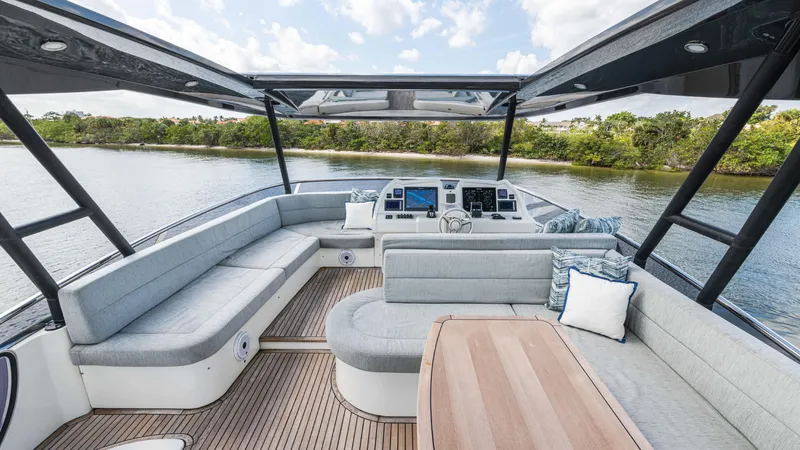 Slide: The Image of Luxurious 2016 Monte Carlo Yachts MCY 65 interior with spacious seating and elegant design. - 17