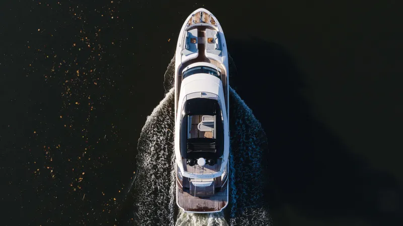 Slide: The Image of Aerial view of 2016 Monte Carlo Yachts MCY 65 cruising on dark water. - 2