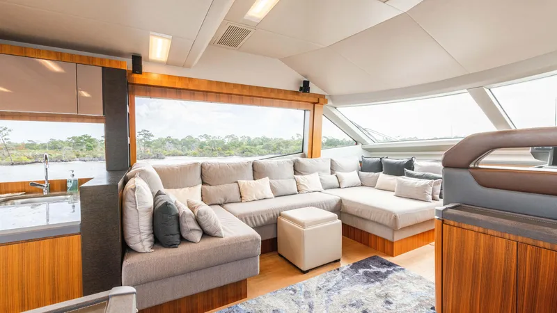 Slide: The Image of Luxurious interior of 2016 Monte Carlo Yachts MCY 65 with plush seating and modern design. - 34