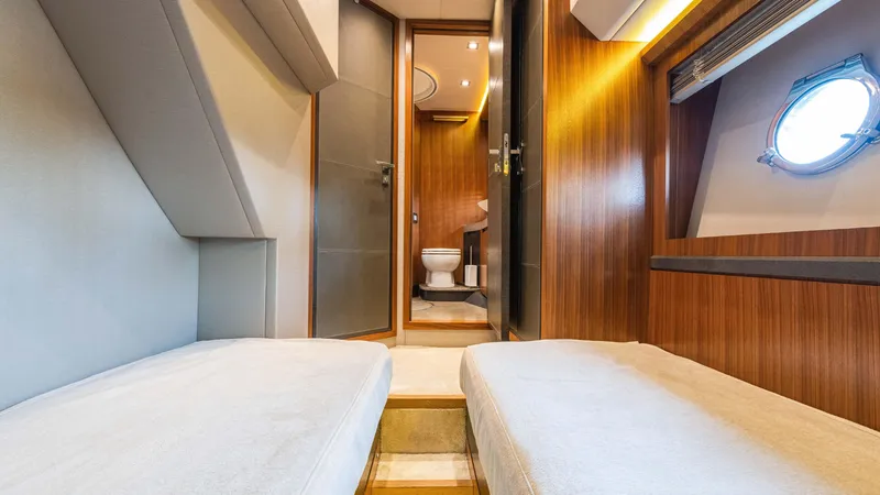 Slide: The Image of Luxurious interior of 2016 Monte Carlo Yachts MCY 65, featuring cozy cabin and modern bathroom. - 43