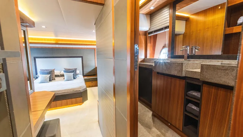 Slide: The Image of Luxurious interior of 2016 Monte Carlo Yachts MCY 65, featuring bedroom and bathroom. - 45