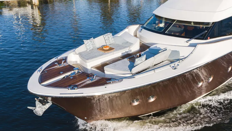 Slide: The Image of Luxurious 2016 Monte Carlo Yachts MCY 65 cruising on serene waters. - 7