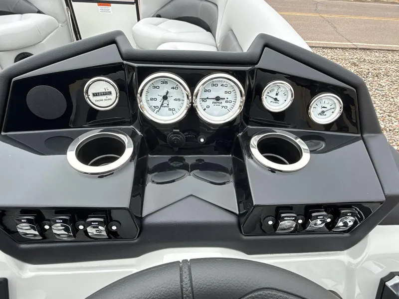 Slide: The Image of Dashboard of 2025 Landau ISLAND BREEZE 23 with gauges and controls. - 15