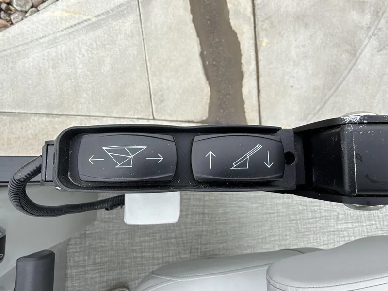 Slide: The Image of Control panel of 2025 Landau ISLAND BREEZE 23 with directional and tilt buttons. - 22