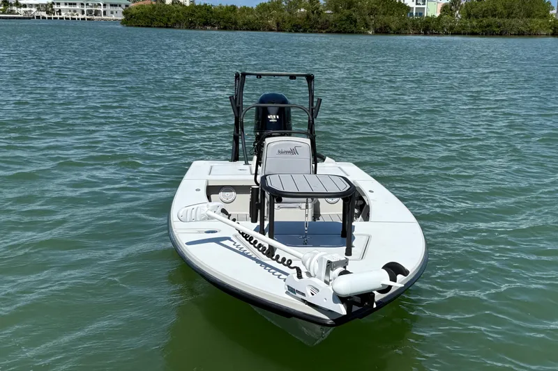 Slide: The Image of 2017 Maverick 18 HPX-V boat on calm water, featuring sleek design and modern equipment. - 9