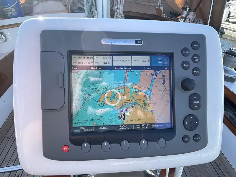 Slide: The Image of Raymarine E- 80 at helm. - 30