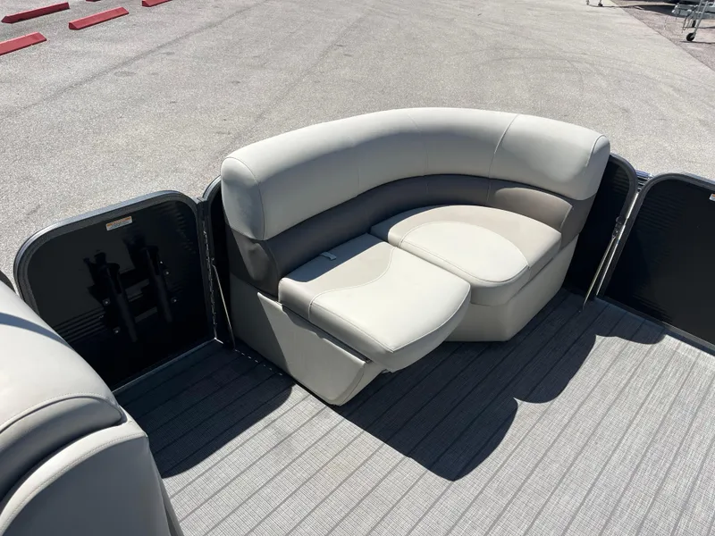 Slide: The Image of 2020 Manitou 20 Aurora LE Standard pontoon boat with gray seating and flooring. - 12