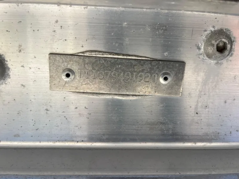 Slide: The Image of Metal identification plate on 2020 Manitou 20 Aurora LE Standard boat. - 18