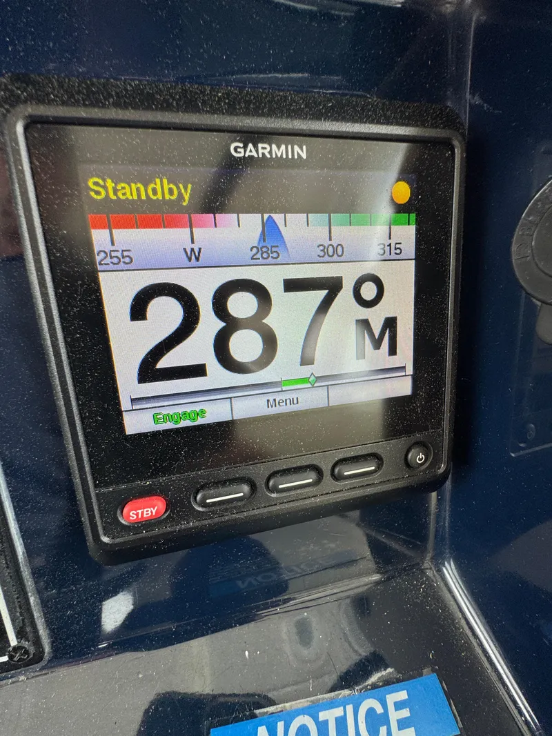 Slide: The Image of Garmin navigation display on 2019 Pursuit DC 365 Dual Console, showing heading 287 degrees. - 20