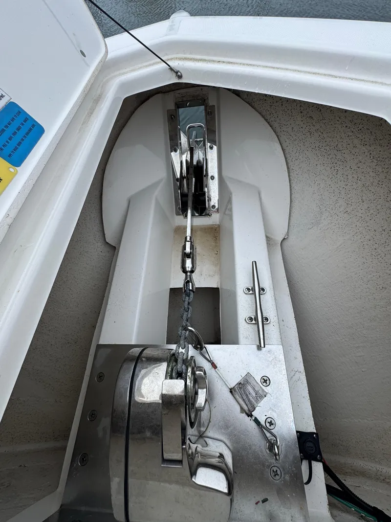 Slide: The Image of Anchor system of a 2019 Pursuit DC 365 Dual Console boat. - 33