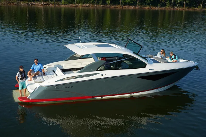 Slide: The Image of Manufacturer Provided Image: 2018 Cobalt A36 boat on a lake with people enjoying the water. - 10