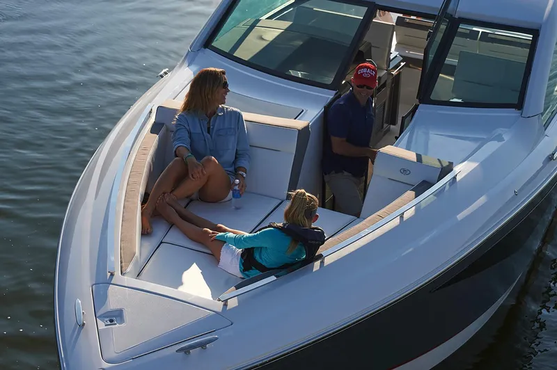 Slide: The Image of Manufacturer Provided Image: 2018 Cobalt A36 boat with people relaxing on deck. - 12