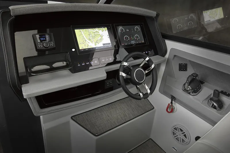 Slide: The Image of Manufacturer Provided Image: 2018 Cobalt A36 boat helm with navigation system and controls. - 13