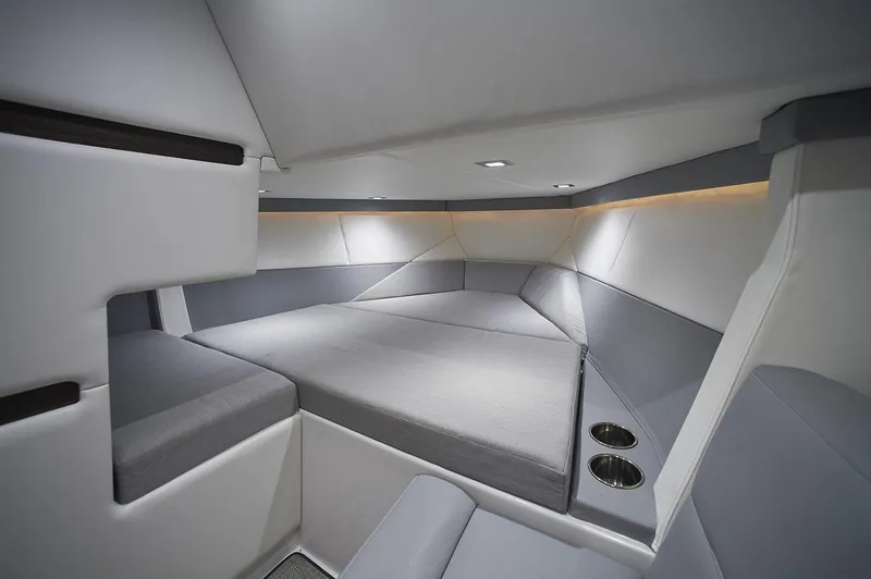 Slide: The Image of Manufacturer Provided Image: Interior cabin of 2018 Cobalt A36 boat with modern seating and cup holders. - 14