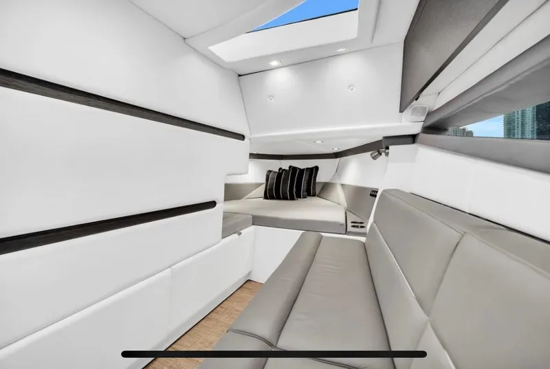 Slide: The Image of Interior of 2018 Cobalt A36 boat with modern seating and skylight. - 9