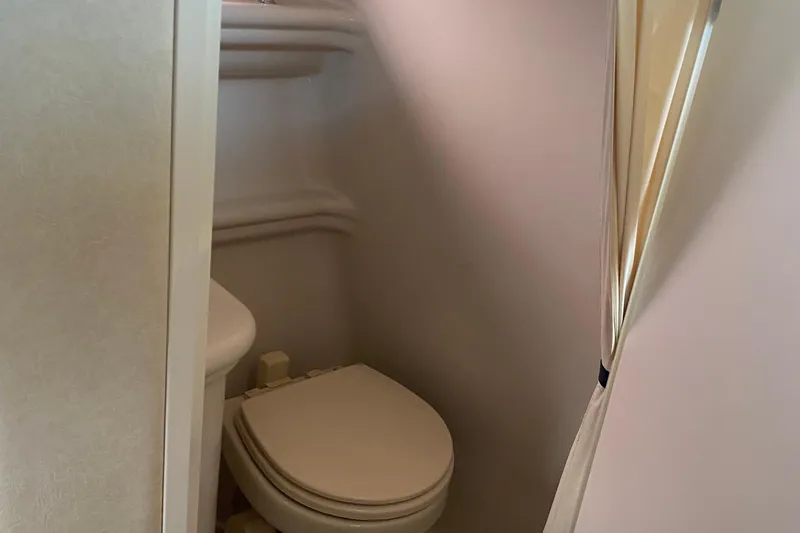 Slide: The Image of Compact bathroom in 2008 Sea Ray 270 Amberjack boat. - 21