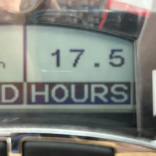 Slide: The Image of Close-up of 2023 Four Winns HD3 engine hour meter displaying 17.5 hours. - 34