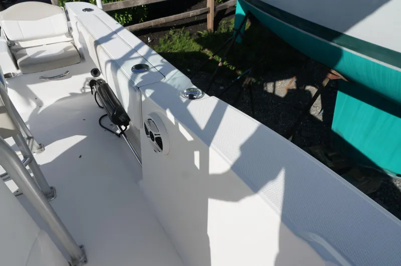Slide: The Image of 2012 Robalo R200 Center Console boat interior with seating and equipment. - 25