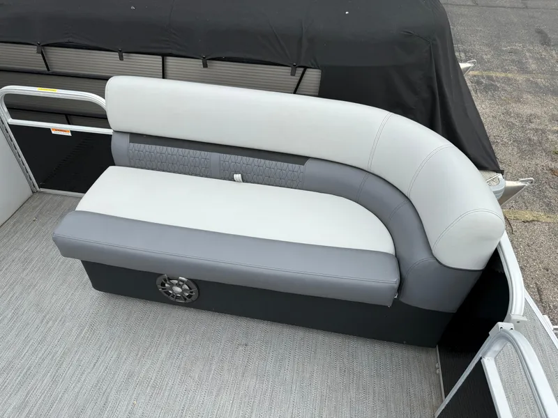 Slide: The Image of 2023 Godfrey Sweetwater boat seating with gray and white upholstery. - 6