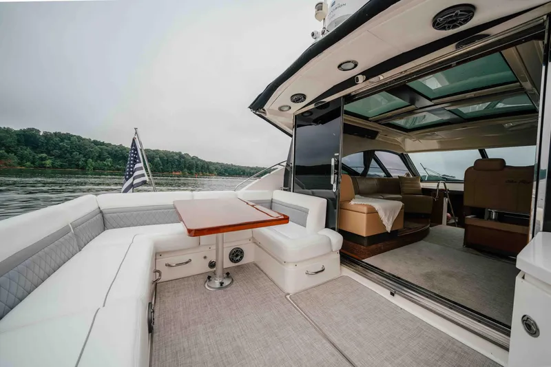 Slide: The Image of Luxurious 2013 Sea Ray 510 Sundancer yacht with spacious seating and elegant interior. - 22
