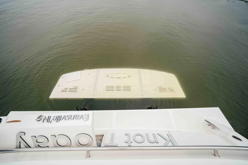 Slide: The Image of 2013 Sea Ray 510 Sundancer yacht with swim platform on calm water. - 24