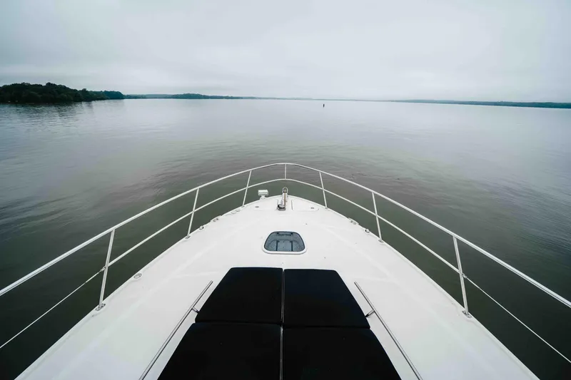 Slide: The Image of Bow view of 2013 Sea Ray 510 Sundancer on calm waters. - 36