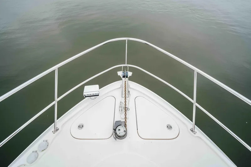 Slide: The Image of Bow of 2013 Sea Ray 510 Sundancer yacht with anchor chain and railing. - 37