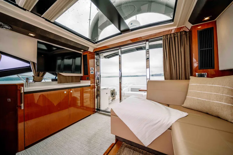 Slide: The Image of Luxurious interior of 2013 Sea Ray 510 Sundancer yacht with modern amenities and scenic view. - 41