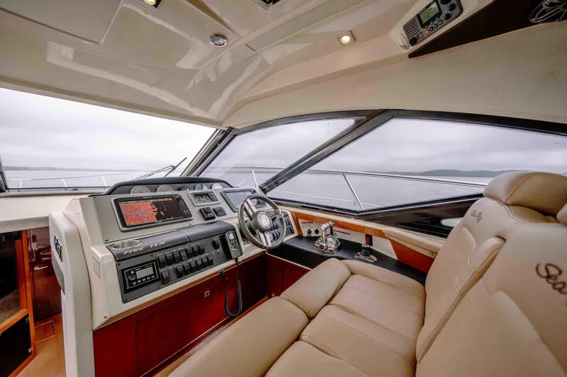 Slide: The Image of Luxurious 2013 Sea Ray 510 Sundancer yacht cockpit with modern navigation equipment. - 44