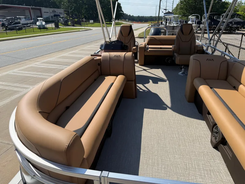 Slide: The Image of 2025 Avalon Venture 85 Versatile Rear Bench pontoon boat with tan seating and spacious layout. - 11