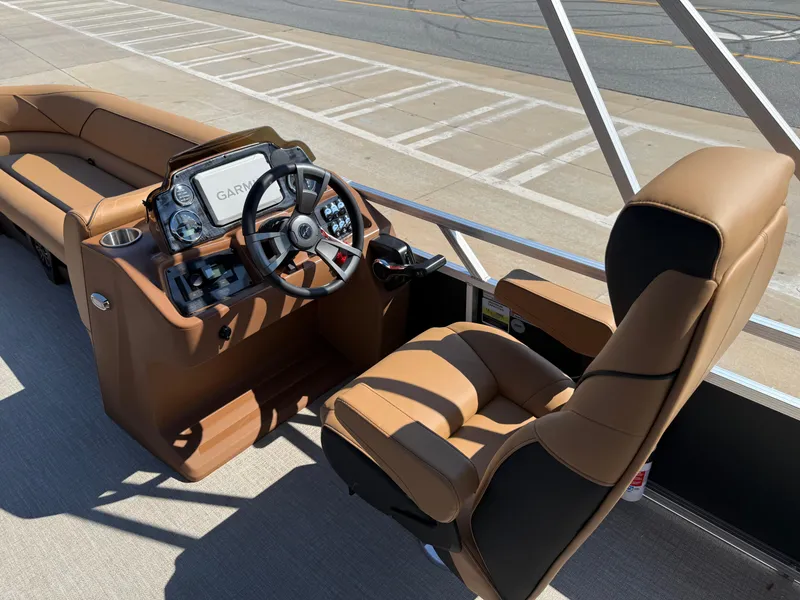 Slide: The Image of 2025 Avalon Venture 85 Versatile rear Bench boat interior with steering wheel and seating. - 19
