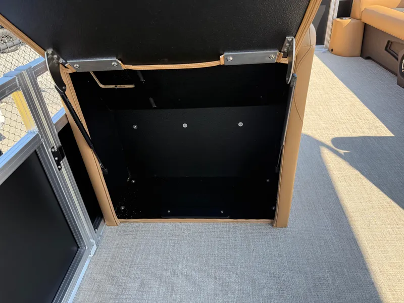 Slide: The Image of Open storage compartment in 2025 Avalon Venture 85 Versatile rear Bench boat. - 40