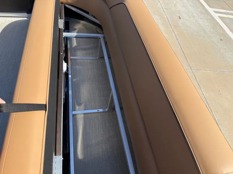 Slide: The Image of 2025 Avalon Venture 85 Versatile rear bench with tan upholstery and storage compartment. - 48