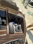 Slide: The Image of Control panel of a 2022 Bennington 30 RSRAX2 boat, featuring a joystick and display. - 25