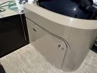 Slide: The Image of 2022 Bennington 30 RSRAX2 boat interior detail with storage compartment. - 28