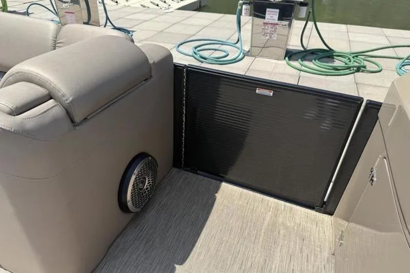 Slide: The Image of Interior of 2022 Bennington 30 RSRAX2 boat with seating and speaker. - 34