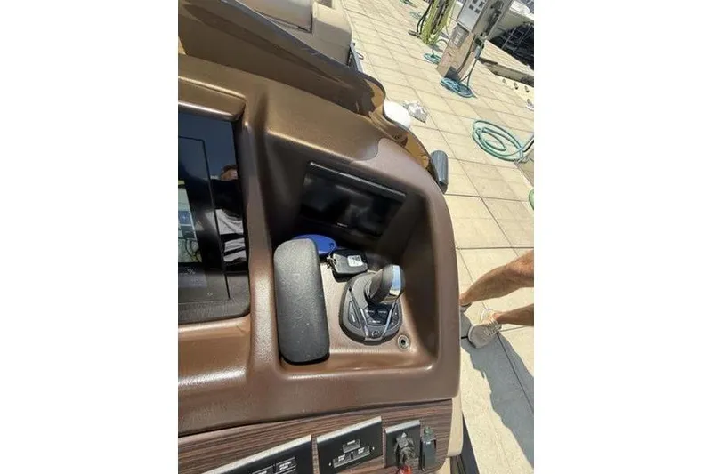 Slide: The Image of Control panel of 2022 Bennington 30 RSRAX2 boat with throttle and display. - 37