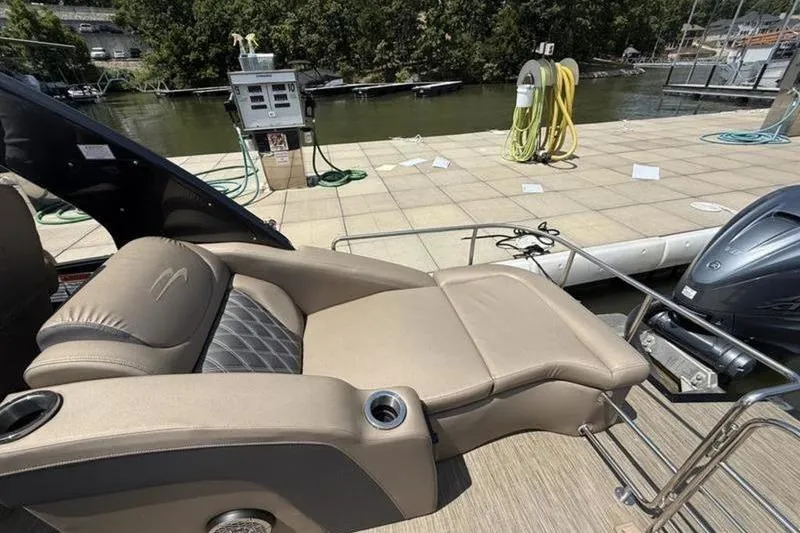 Slide: The Image of Luxurious seating on 2022 Bennington 30 RSRAX2 boat at dockside. - 39