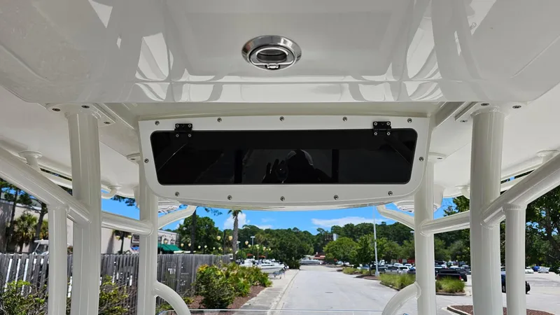 Slide: The Image of 2025 Ranger 2360 Bay boat interior with overhead storage compartment. - 14