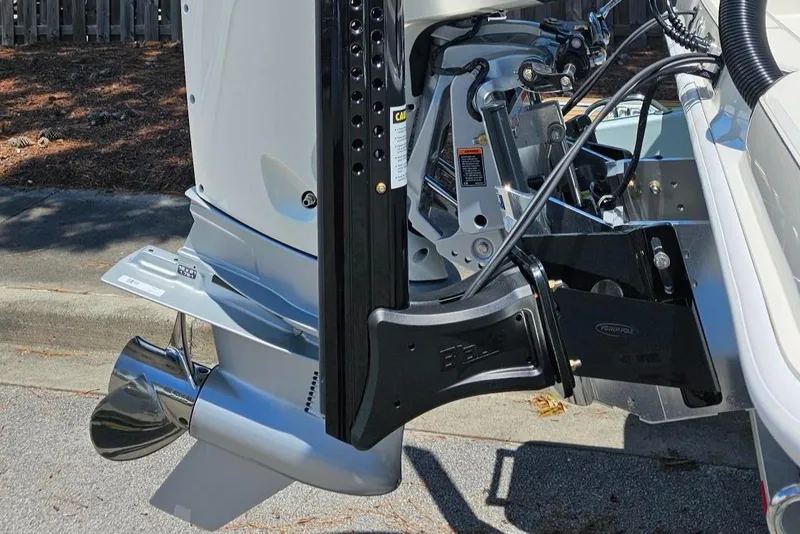 Slide: The Image of Close-up of 2025 Ranger 2360 Bay boat engine and propeller system. - 6
