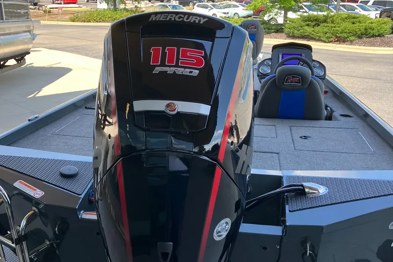 Slide: The Image of 2025 Ranger RT188P boat with Mercury 115 Pro outboard motor, parked outdoors. - 3