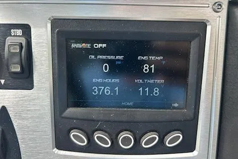 Slide: The Image of 2017 MasterCraft NXT22 dashboard display showing engine metrics and controls. - 34