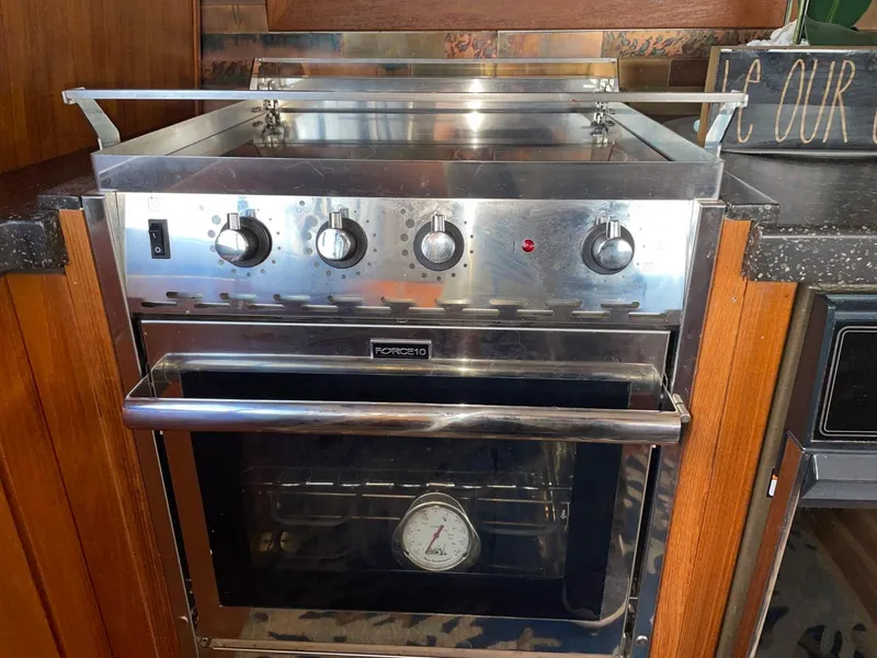 Slide: The Image of Stainless steel oven in 1994 Bayliner 4788 Pilot House Motoryacht kitchen. - 18