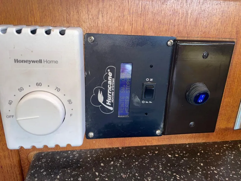 Slide: The Image of Thermostat and control panel on 1994 Bayliner 4788 Pilot House Motoryacht. - 26