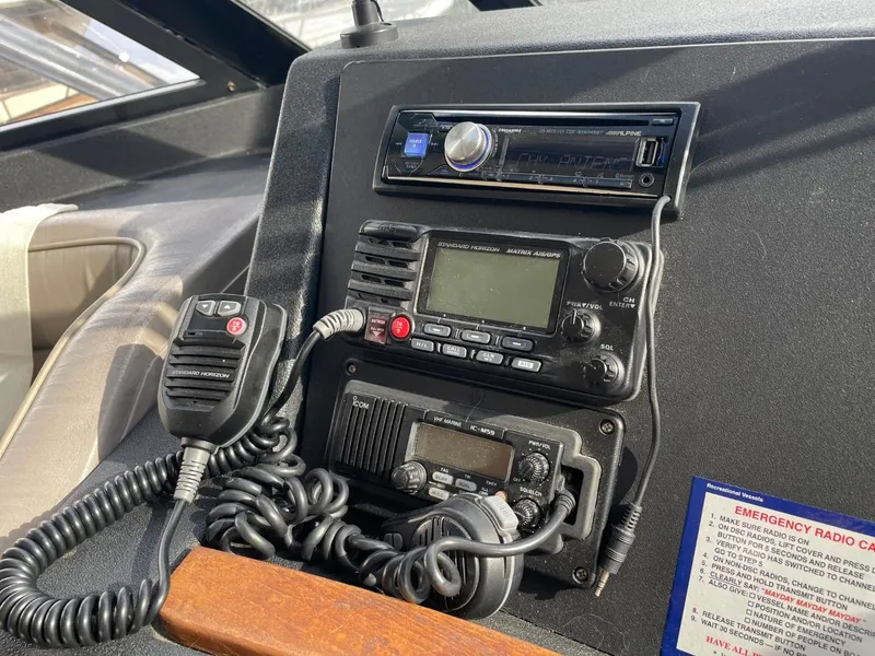 Slide: The Image of Control panel of a 1994 Bayliner 4788 Pilot House Motoryacht with radio equipment. - 35