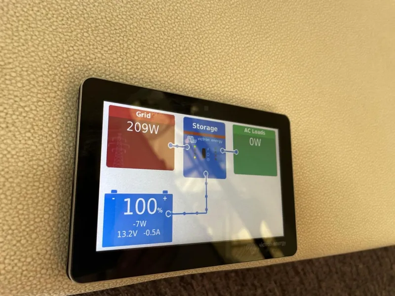 Slide: The Image of Touchscreen display showing power management on a 1994 Bayliner 4788 Pilot House Motoryacht. - 42