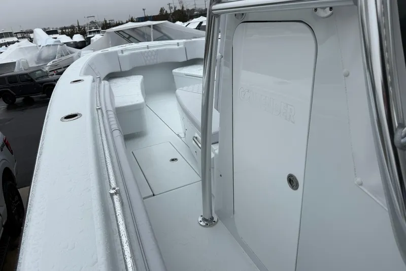 Slide: The Image of 2026 Contender 35 ST boat deck, sleek design with stainless steel railings. - 9