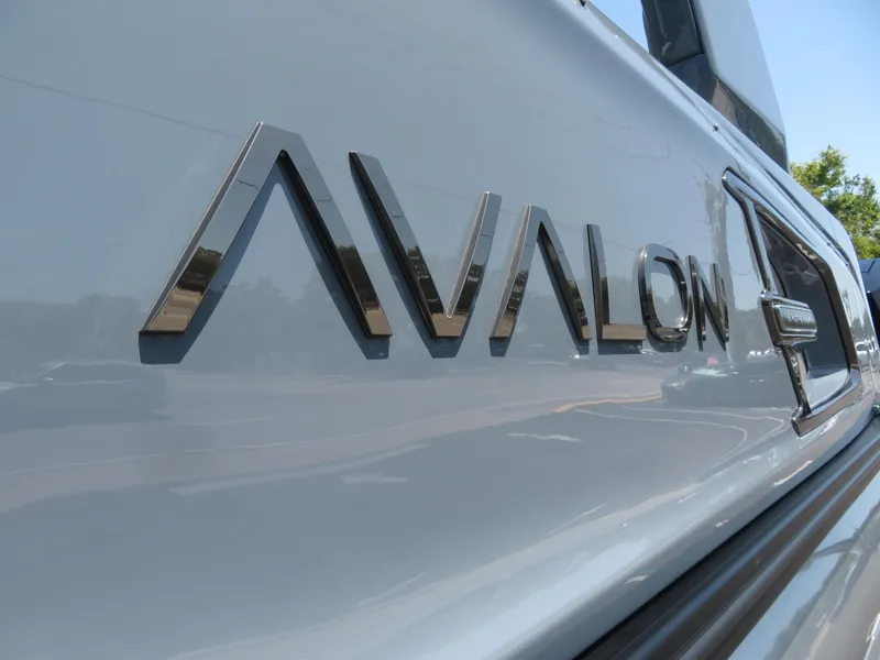 Slide: The Image of 2026 Avalon Excalibur Elite Windshield logo on sleek vehicle exterior. - 11