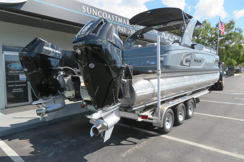 Slide: The Image of 2026 Avalon 2785 Excalibur Carbon Elite tri-toon boat with Mercury engines in Sarasota, FL. - 2