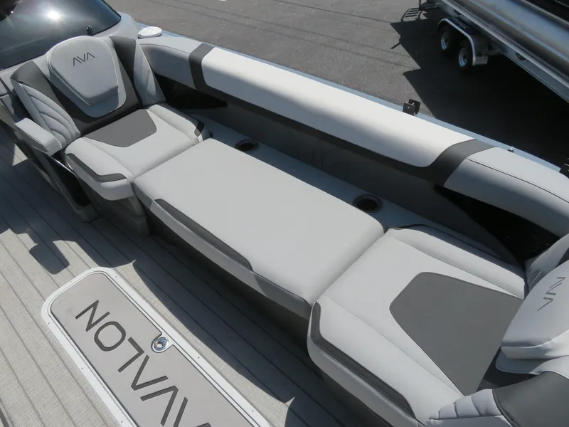 Slide: The Image of Luxurious seating on 2026 Avalon Excalibur Elite Windshield boat, featuring sleek design and comfort. - 22
